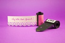 Repurpose Empty Film Roll Canisters as Invitation Holders 