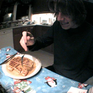 Mat eating a waffle