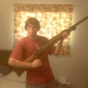 Look at my huge gun.