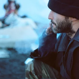 Homeless guy smoking reefer