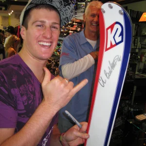 Chris gives autographs and free shakas.