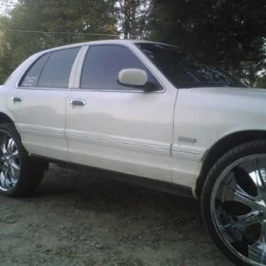 My new crown vic with 26's