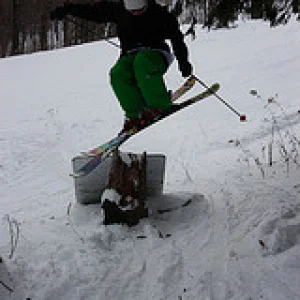 Testing friends skis on a sign?