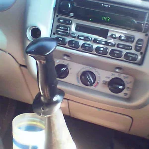 Ski pole handle shifter