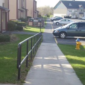 Down the rail next to the road