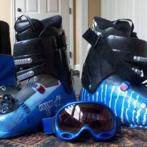 Dyed ski boots and goggles