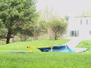 summer rail setup with tarps and water