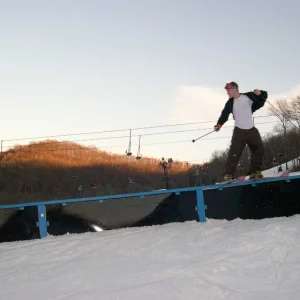 Sliding a rail.