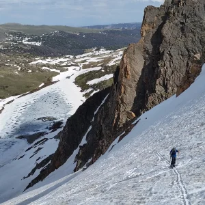 Skiing up the headwall
