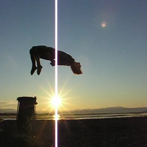 Backflip at beach with sunrise