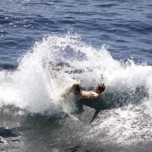 first shot of my surfing ever. micro day at winki, fins out bitch
