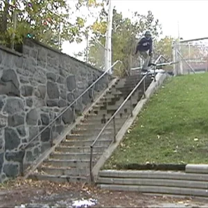 small jump with skier on the rail