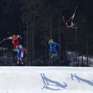 Skier x sending it