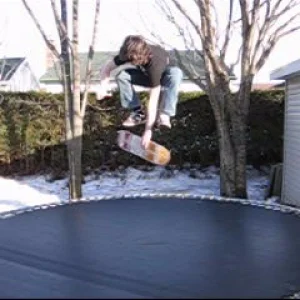 skateboard on trampoline (varial-kick indy)