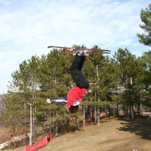 Eric half way through his back flip