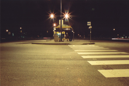 A bus loop in Ladner at night.