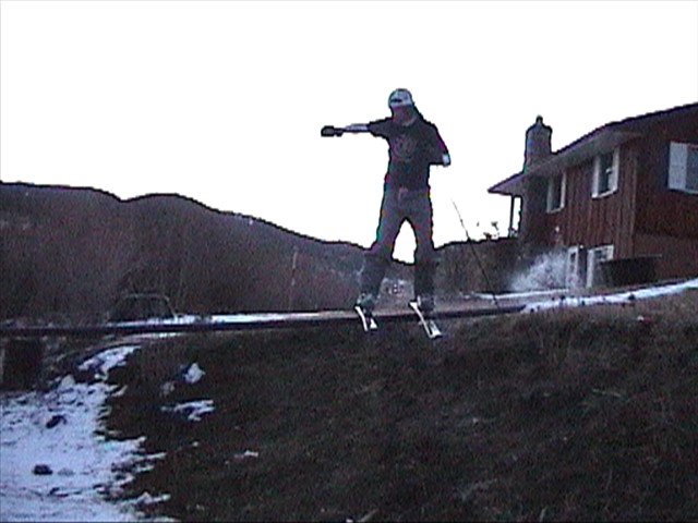 A rail over my ditch with no snow