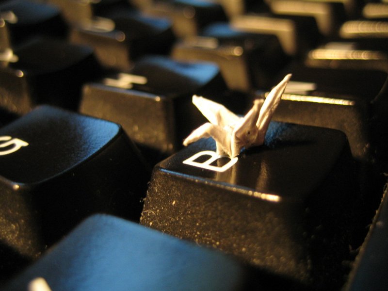 a really teency paper crane