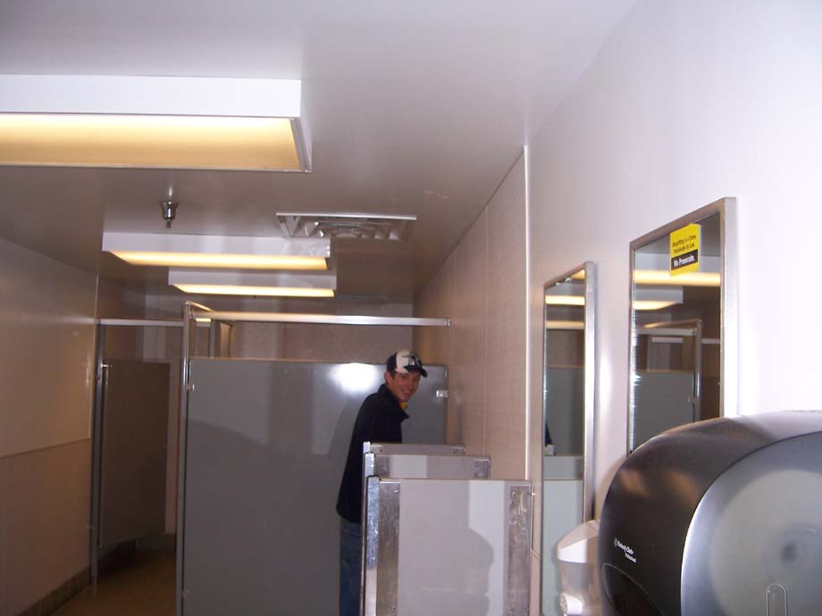 Akers taking a piss. i love how hes still smiling