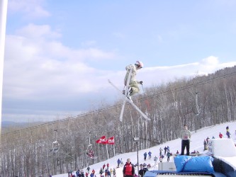 An aerialist doing a 360 tail at the bud air show