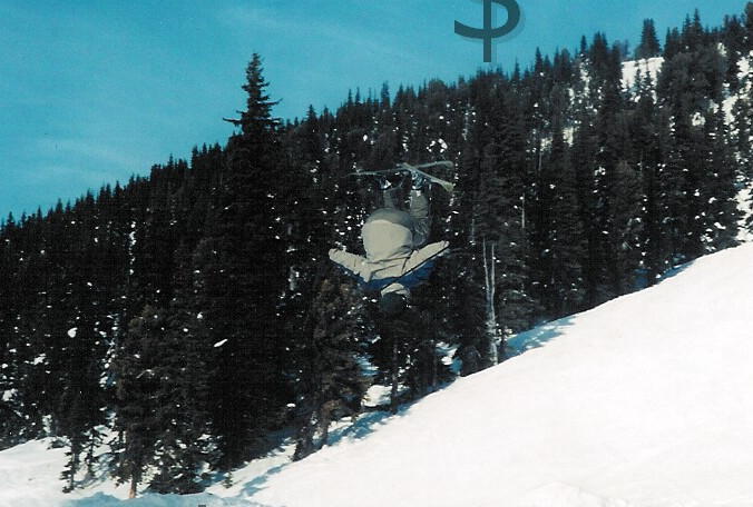 Backflip in Whistler - dollar signs are from editing program