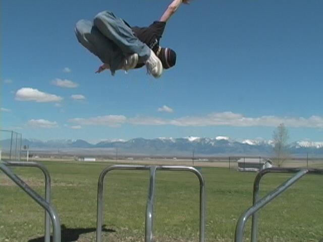 Backflip off moving merry go round