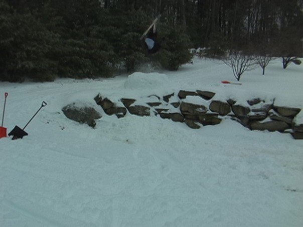 Backflip off stone wall