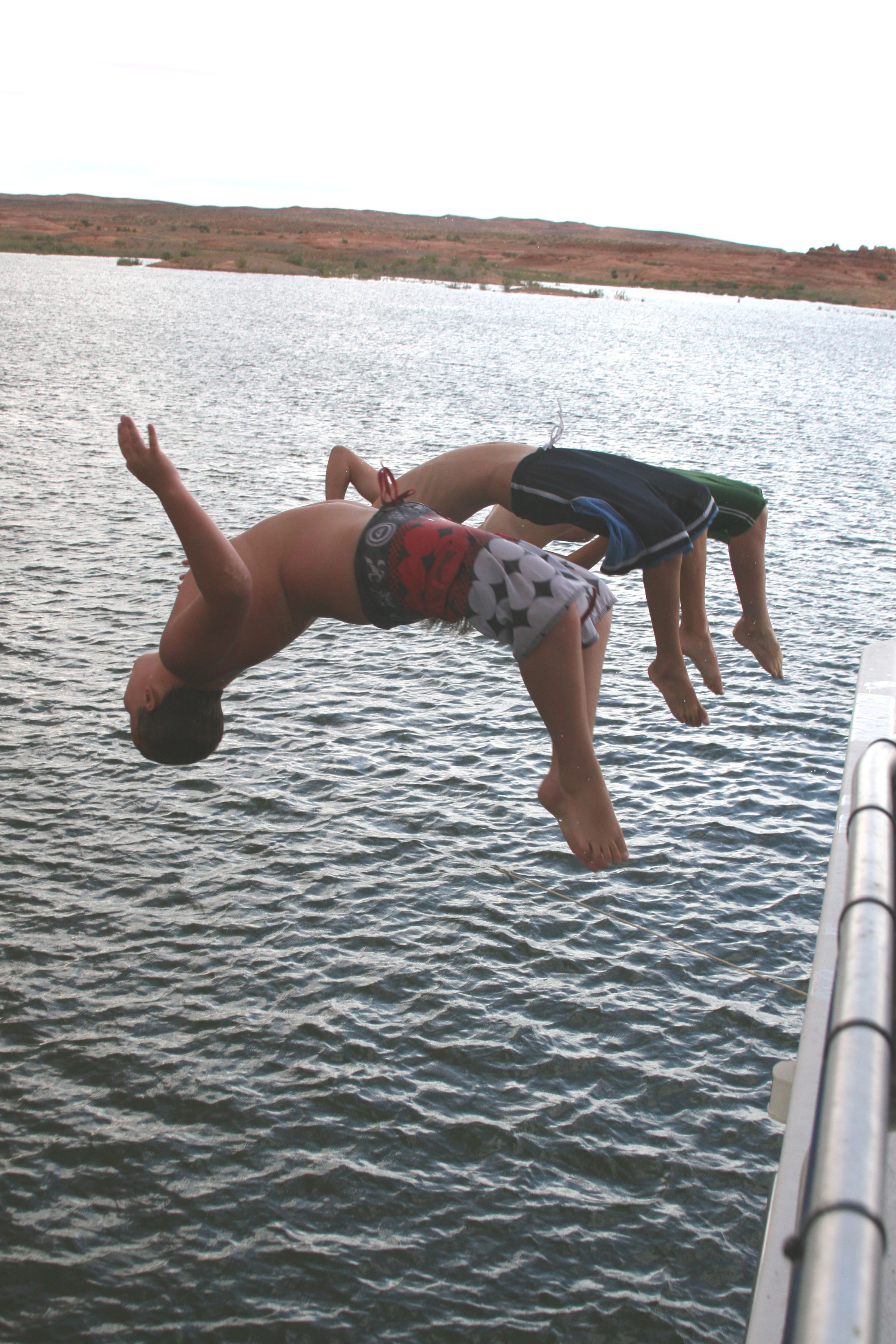 Backlips off the boat at lake powell