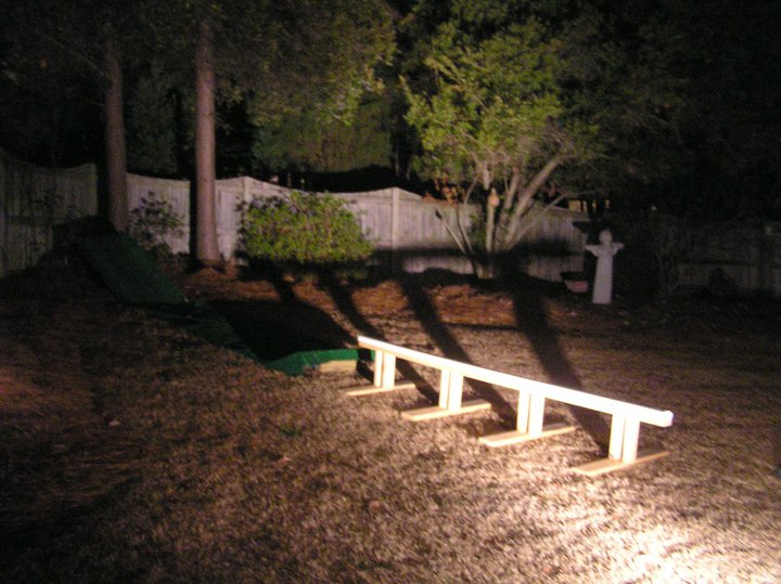 Backyard rail jib from a dog house dropin