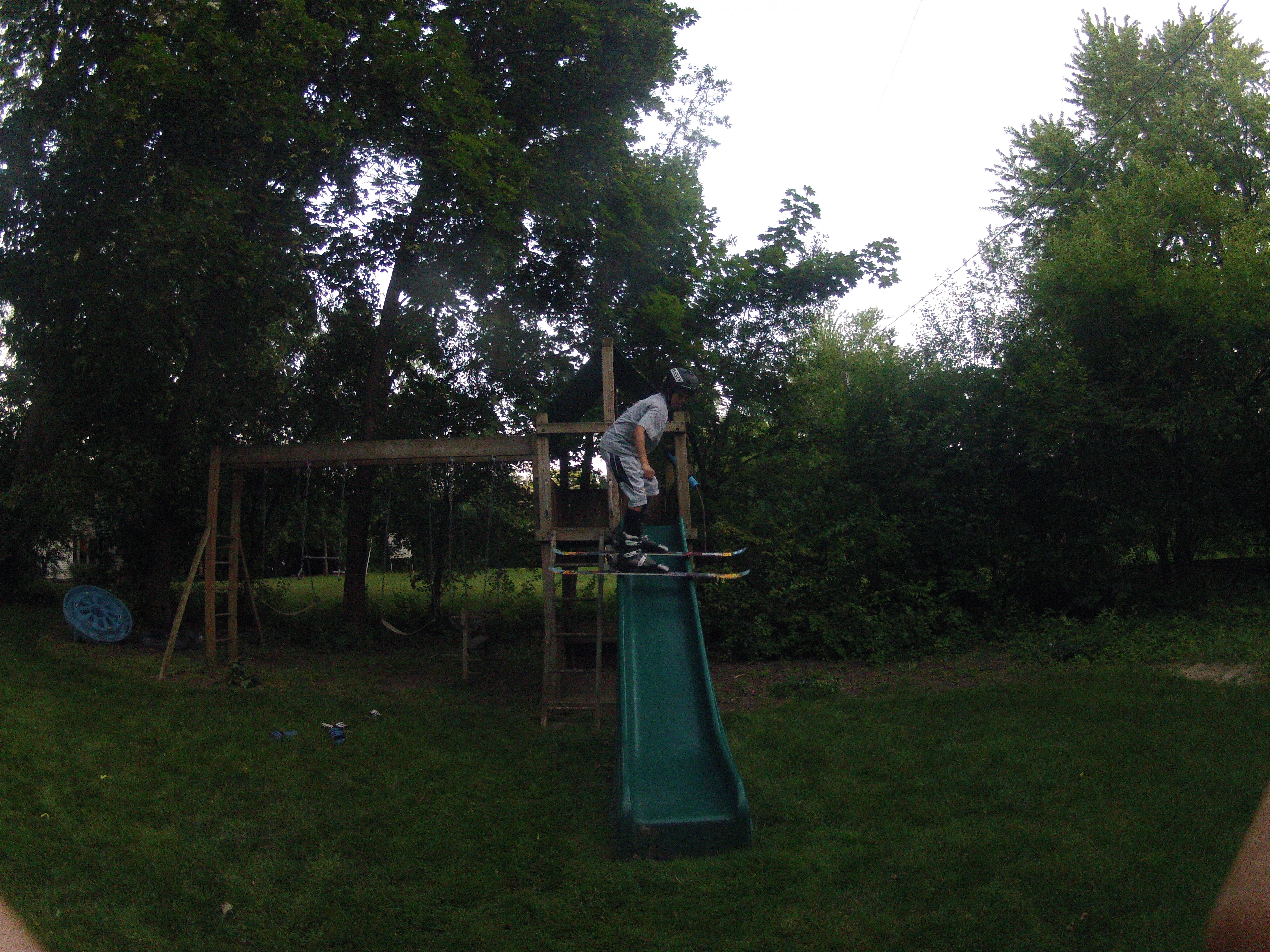 Backyard Skiing Down A Slide!