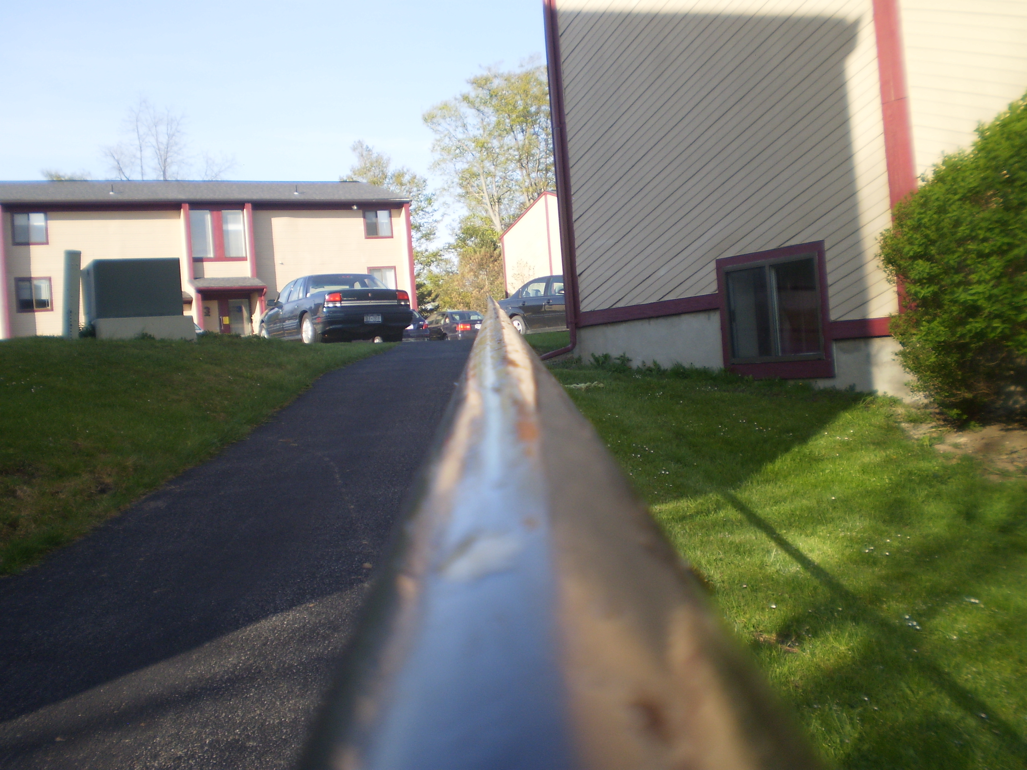 Between the apartments next to P&C