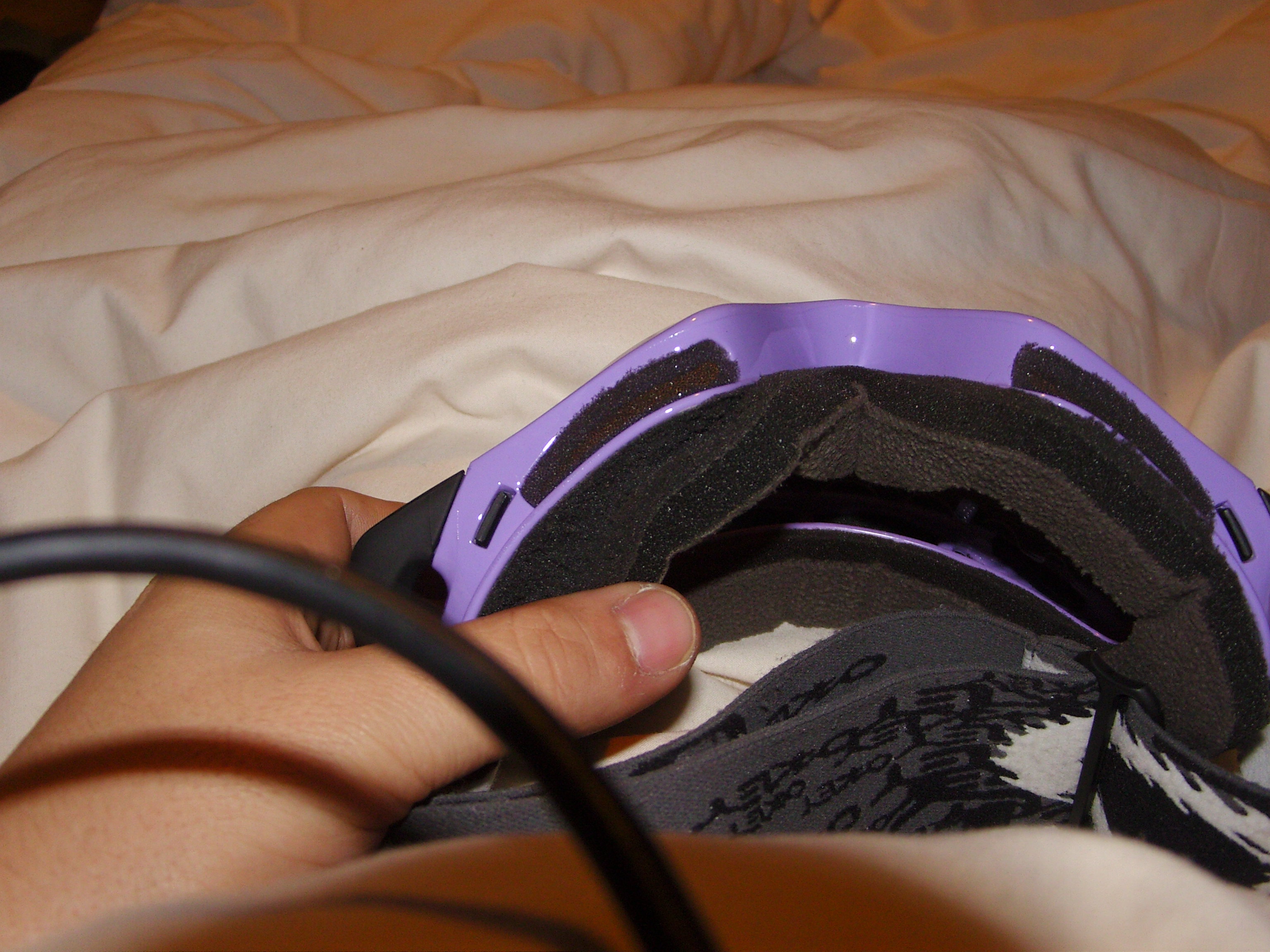 Bigger foam tear, right side on face.