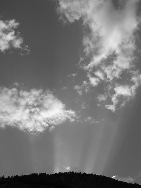 Black and white sky over mountains