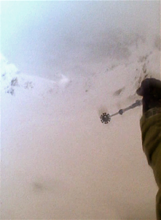 Blizzard chute skiing