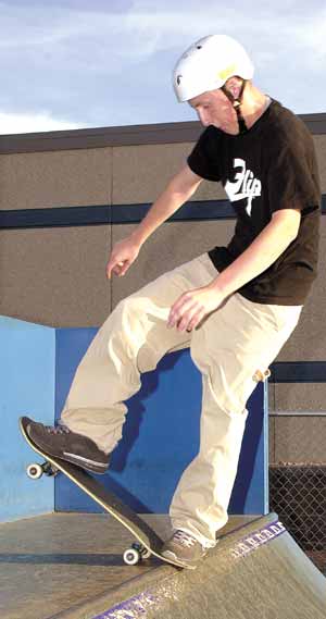 blunt stall on ymca miniramp.  helmet rules are pretty gay!