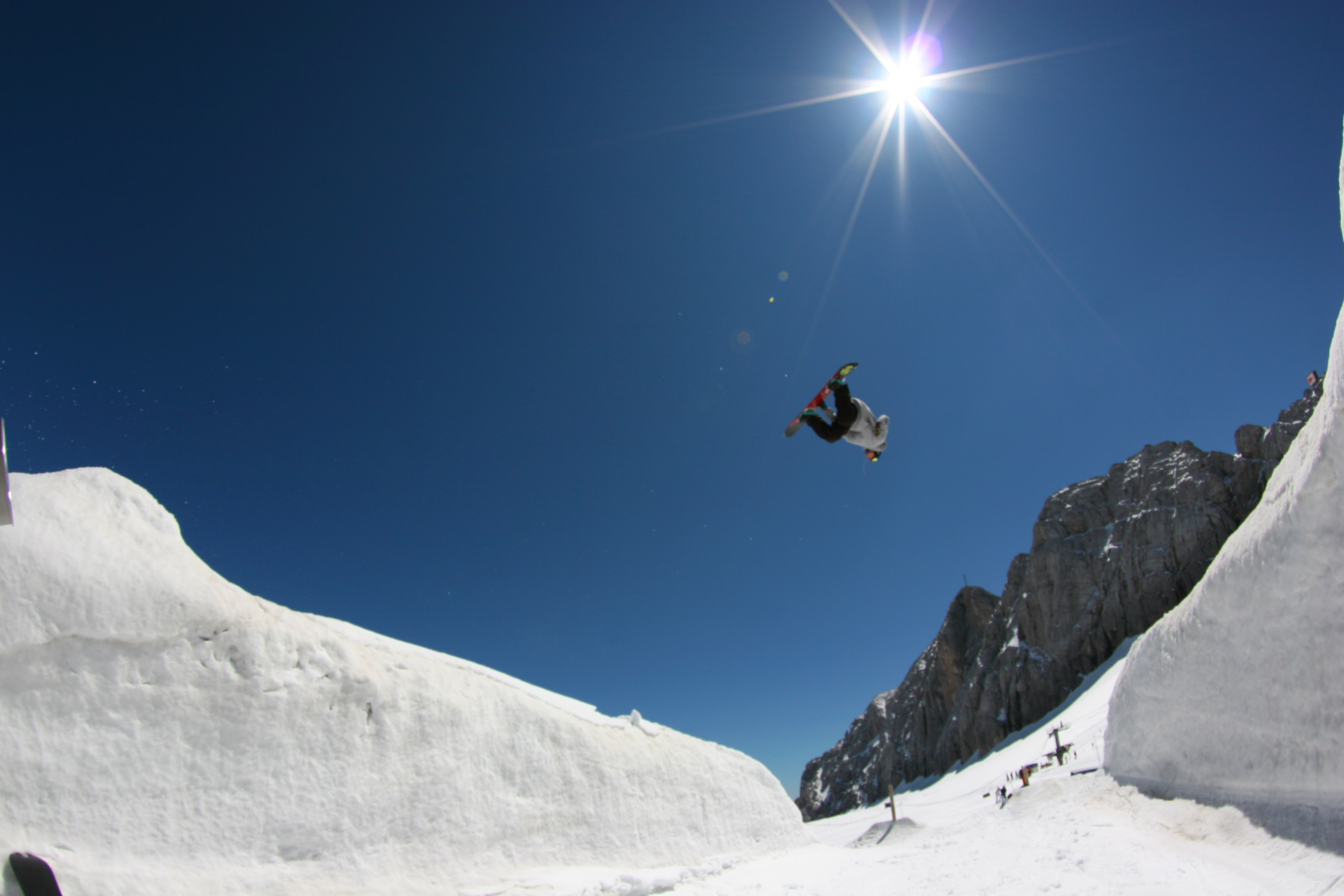 Boarder backflips huge gap