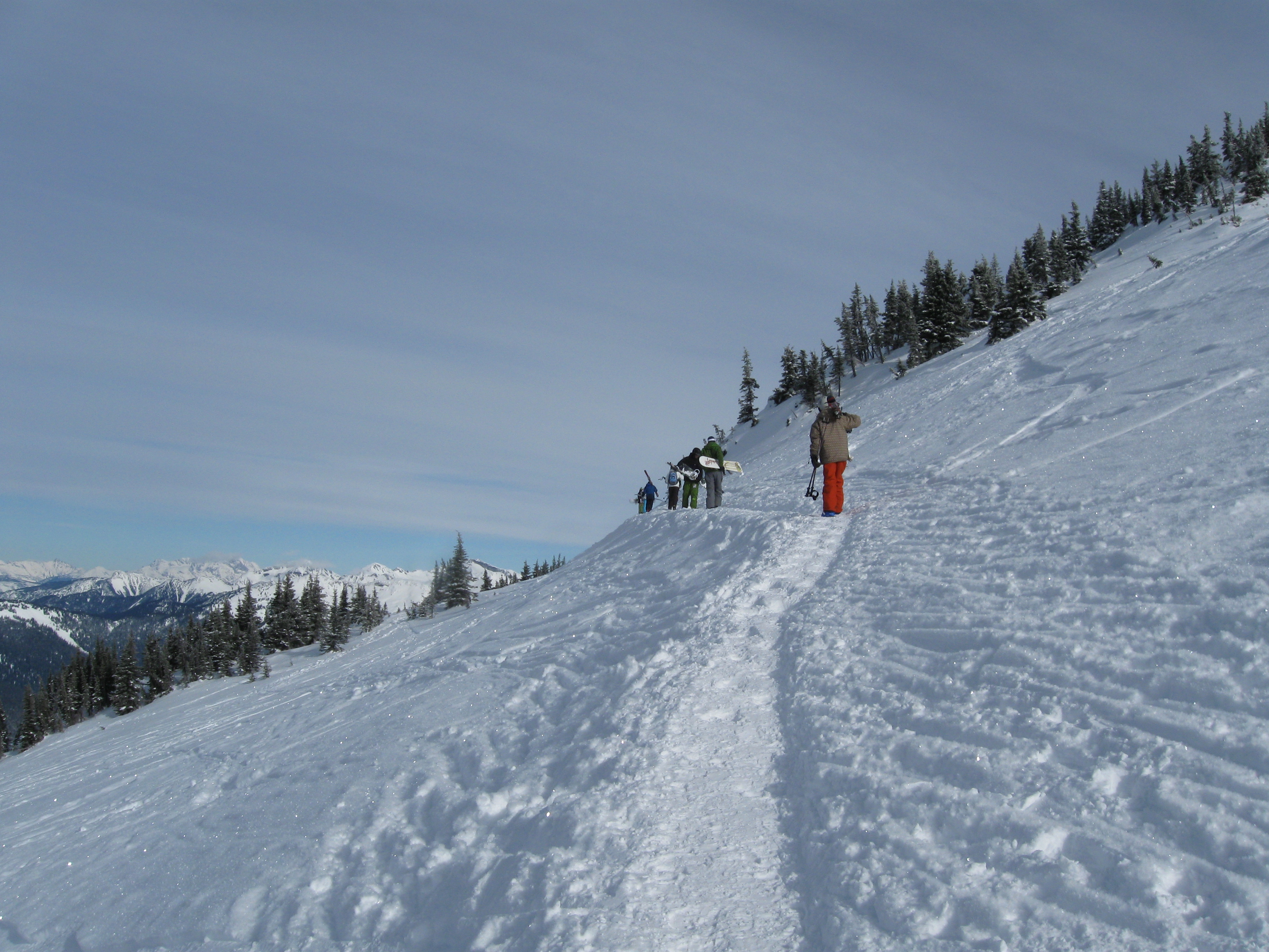 Boot pack up over the ridge at revelstoke