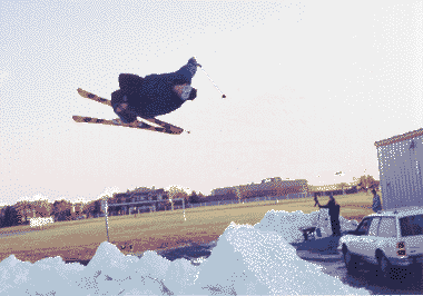 Car tow in behind my high school in the middle of summer on rink snow