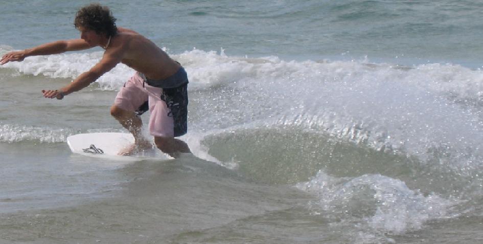 Carving on a skimboard