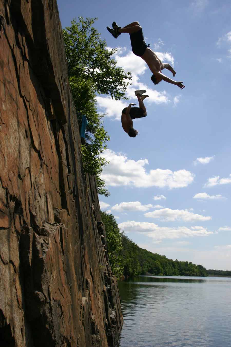 cliff jumping - synchronized backflips