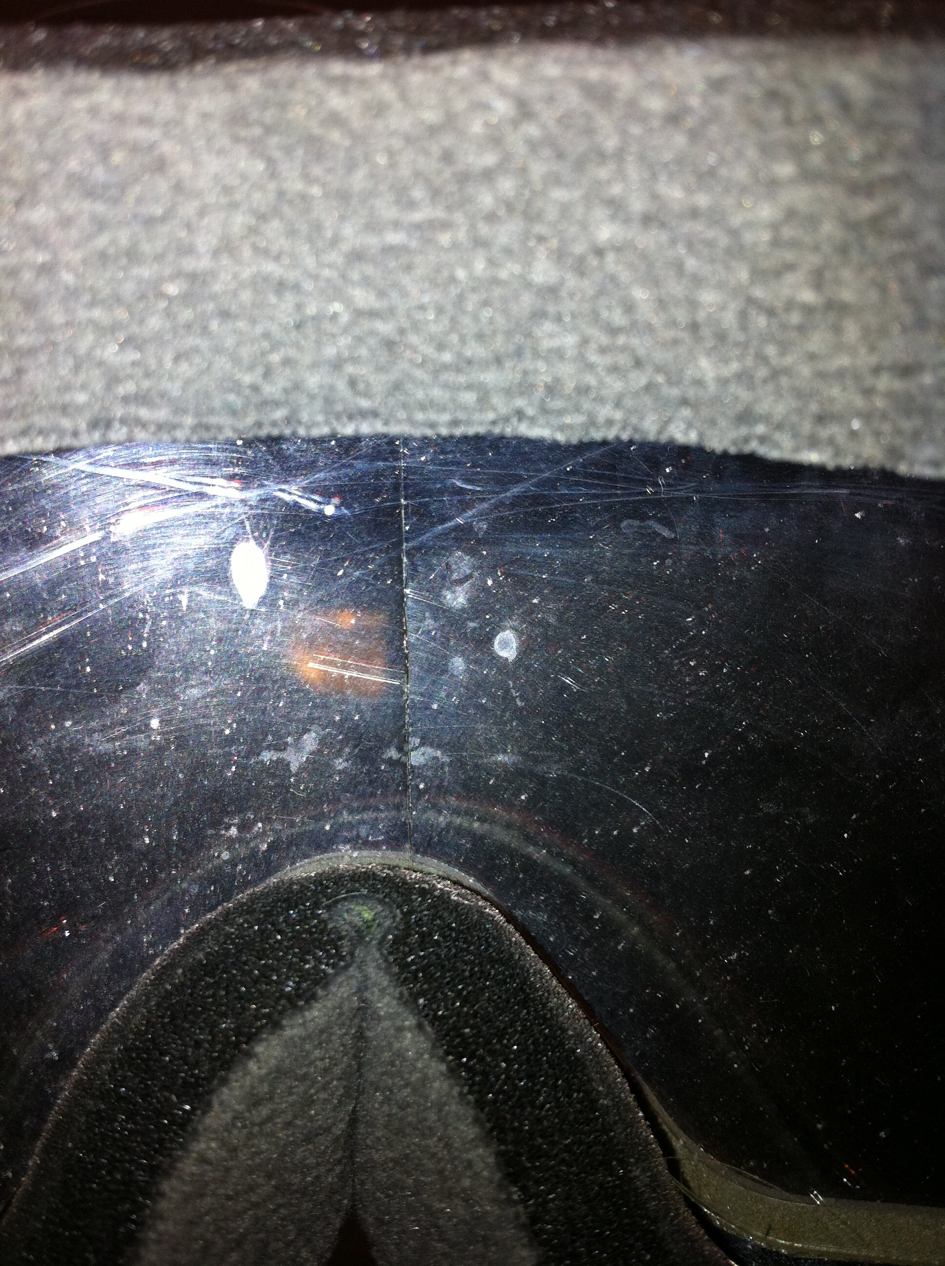 Crack down middle of inside lens