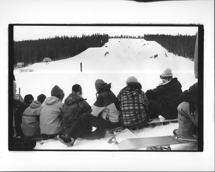 crowd on top of the quarterpipe watching the park