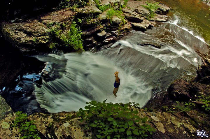 Diving Into a Small Waterfall Pool