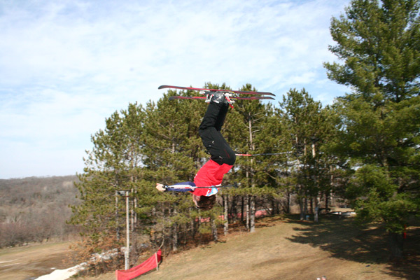 Eric half way through his back flip