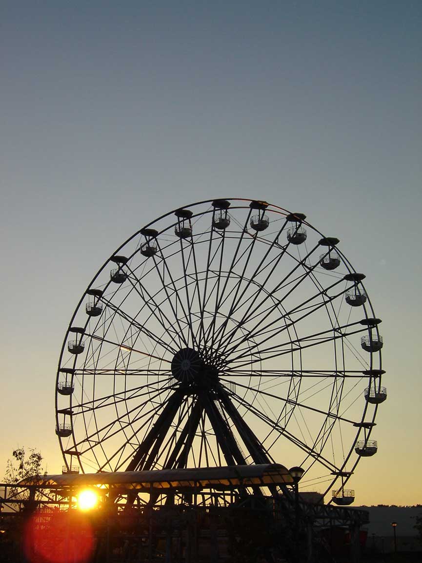 Falling behind the ferris wheel