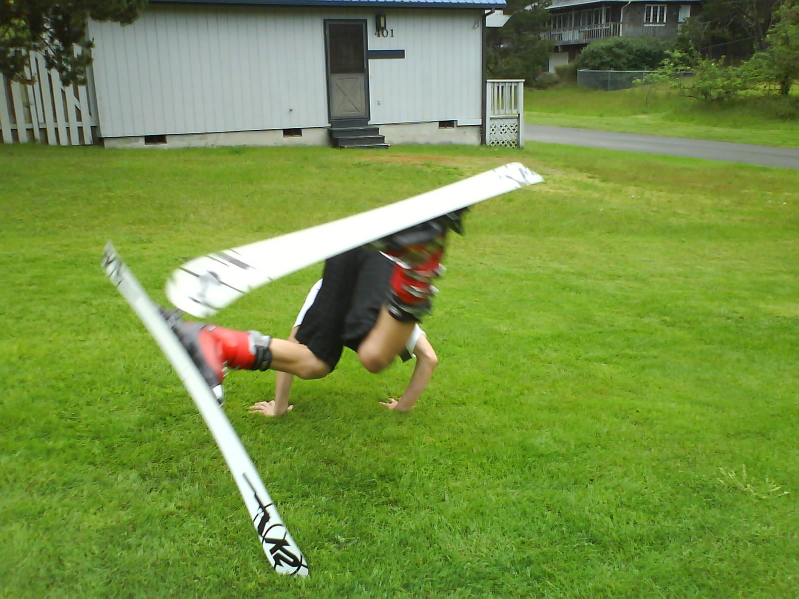 Front flip on grass at beach