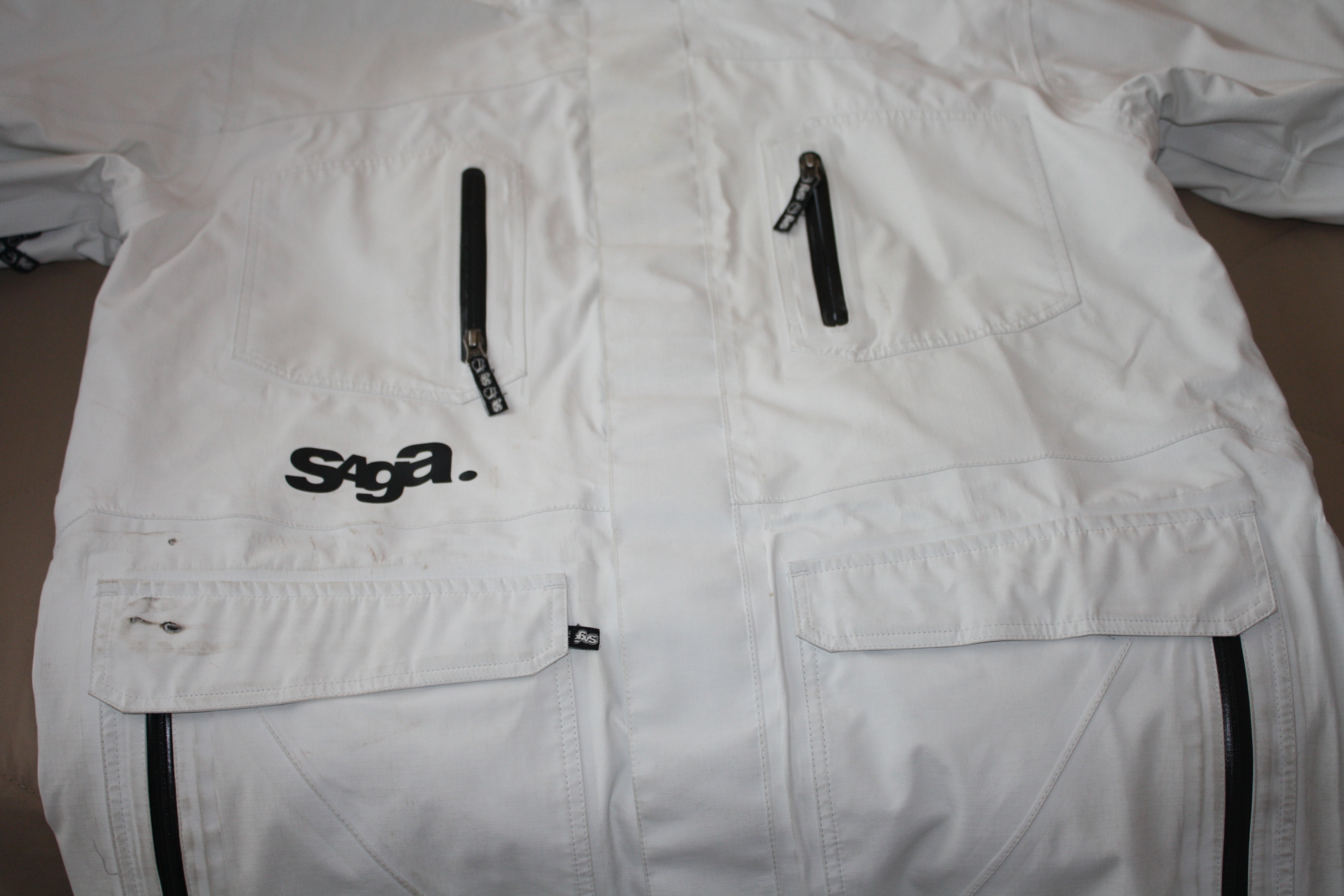 front is clean except a fingernail sized mark/hole