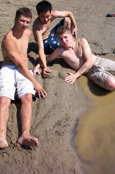 Fun in the sand. 3 desprate guys and a girl.