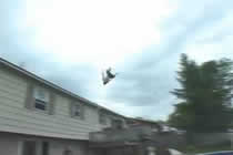 Gainer off two story roof into pool