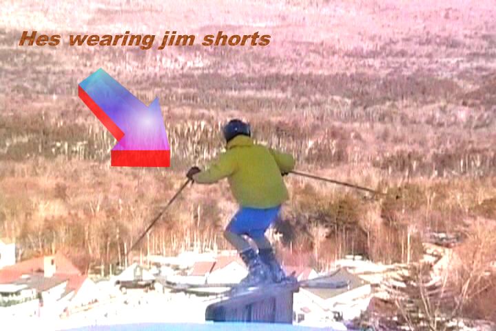 gay kid in shorts grinding a flat rail.